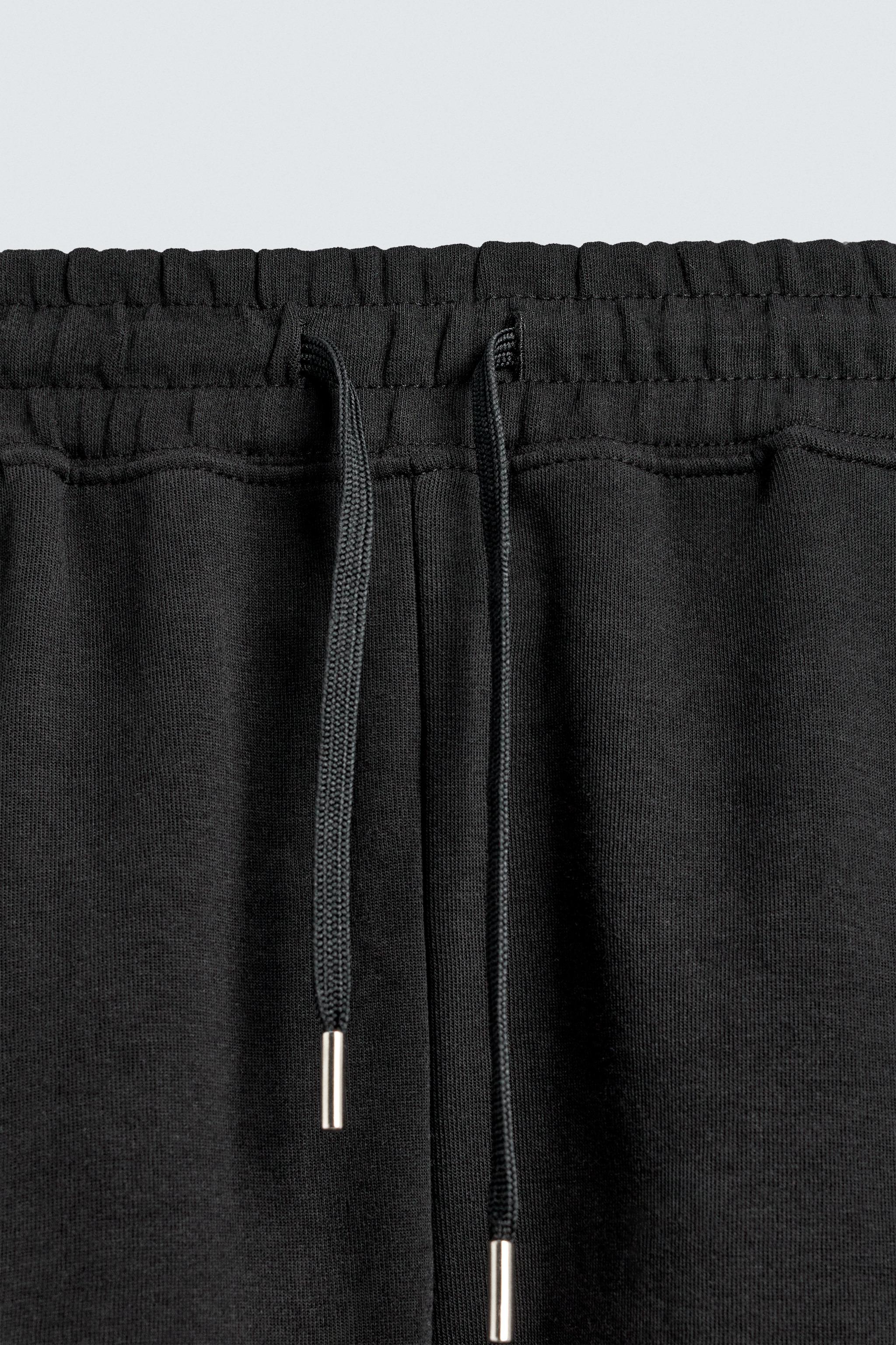 RELAXED FIT INTERLOCK JOGGER SHORTS